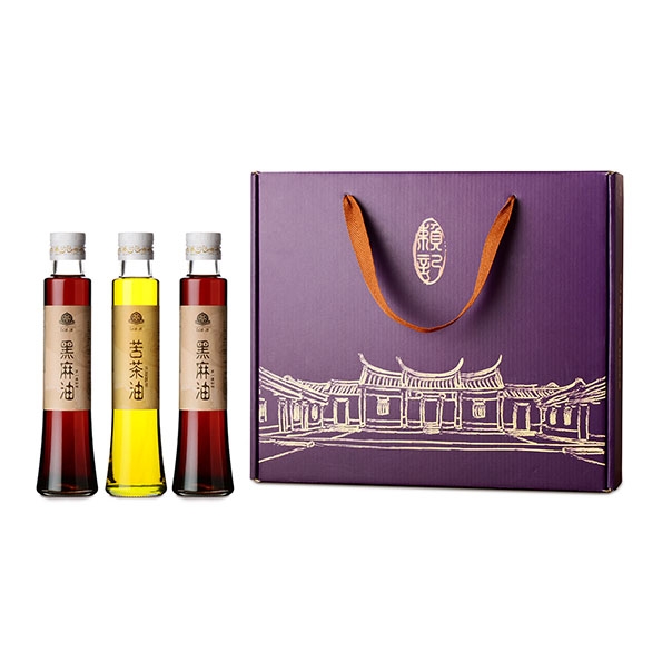 賴記苦茶油昕晨苦茶油禮盒，內含兩瓶黑麻油與一瓶苦茶油，經典紫色禮盒包裝，適合送禮。