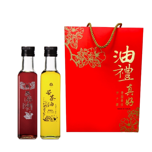 賴記油禮真好禮盒，內含低溫鮮榨苦茶油250ML與嚴選黑麻油250ML，年節送禮、企業贈禮首選，紅色禮盒包裝喜氣健康。